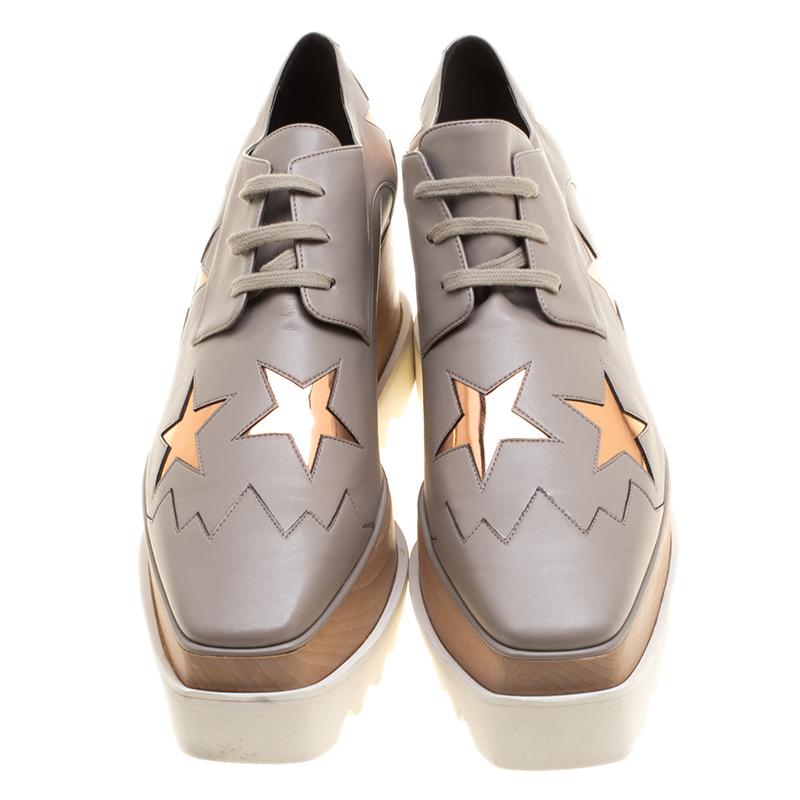 Be the star of the show as you head out wearing these stunning pair from the house of Stella McCartney. These Derby are set on a platform sole and features a beige faux leather body detailed with Elyse star cut-out. Wear with boyfriend jeans and a