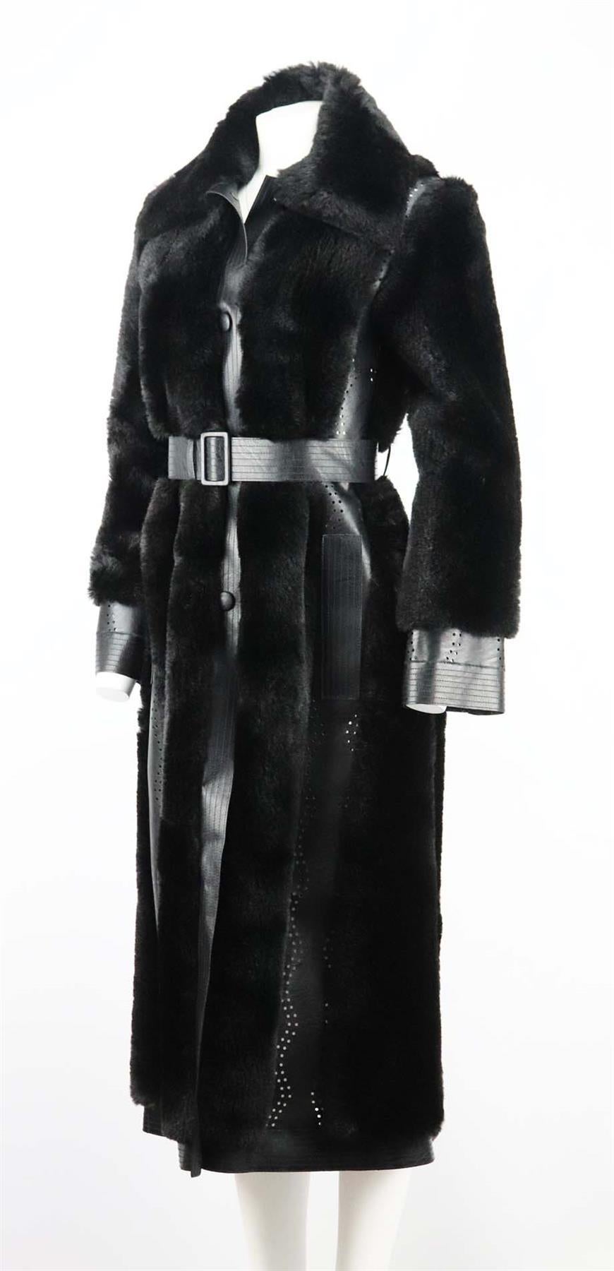 This 'Belen' coat by Stella McCartney is made from the brand's specially formulated vegetarian leather - a reliable, more sustainable alternative to real hides, it's detailed with signature laser-cut perforations and panelled with tufts of plush