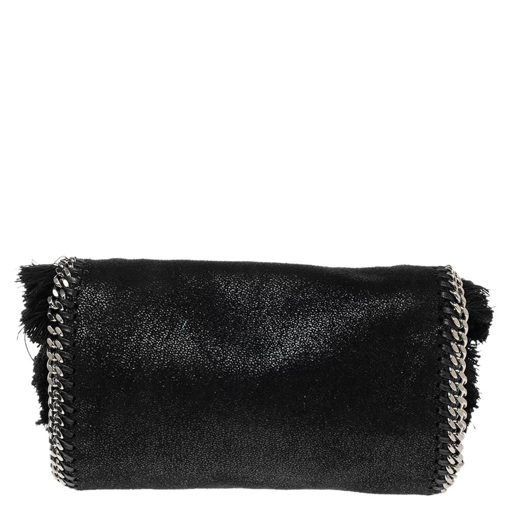 This Falabella flap bag from Stella McCartney is a beauty. Crafted from swan detailed faux leather, it is durable and stylish. While the chain detailing elevate its beauty, the fabric-lined interior will dutifully hold all your daily essentials. You