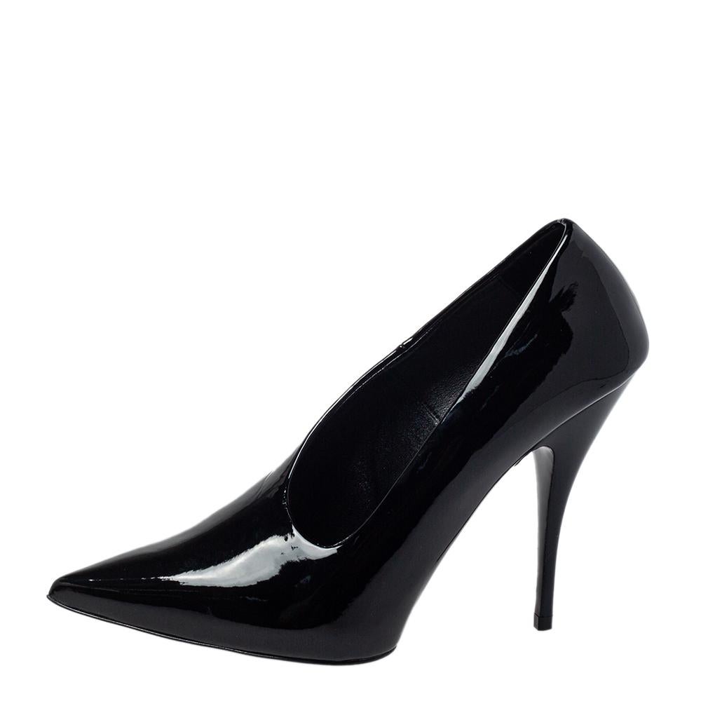You are sure to fall head over heels in love with this pair of pumps from Stella McCartney. These stylish pumps are crafted in Italy from faux patent leather and come in a shade of black. They are styled with pointed toes and 11 cm heels. They are