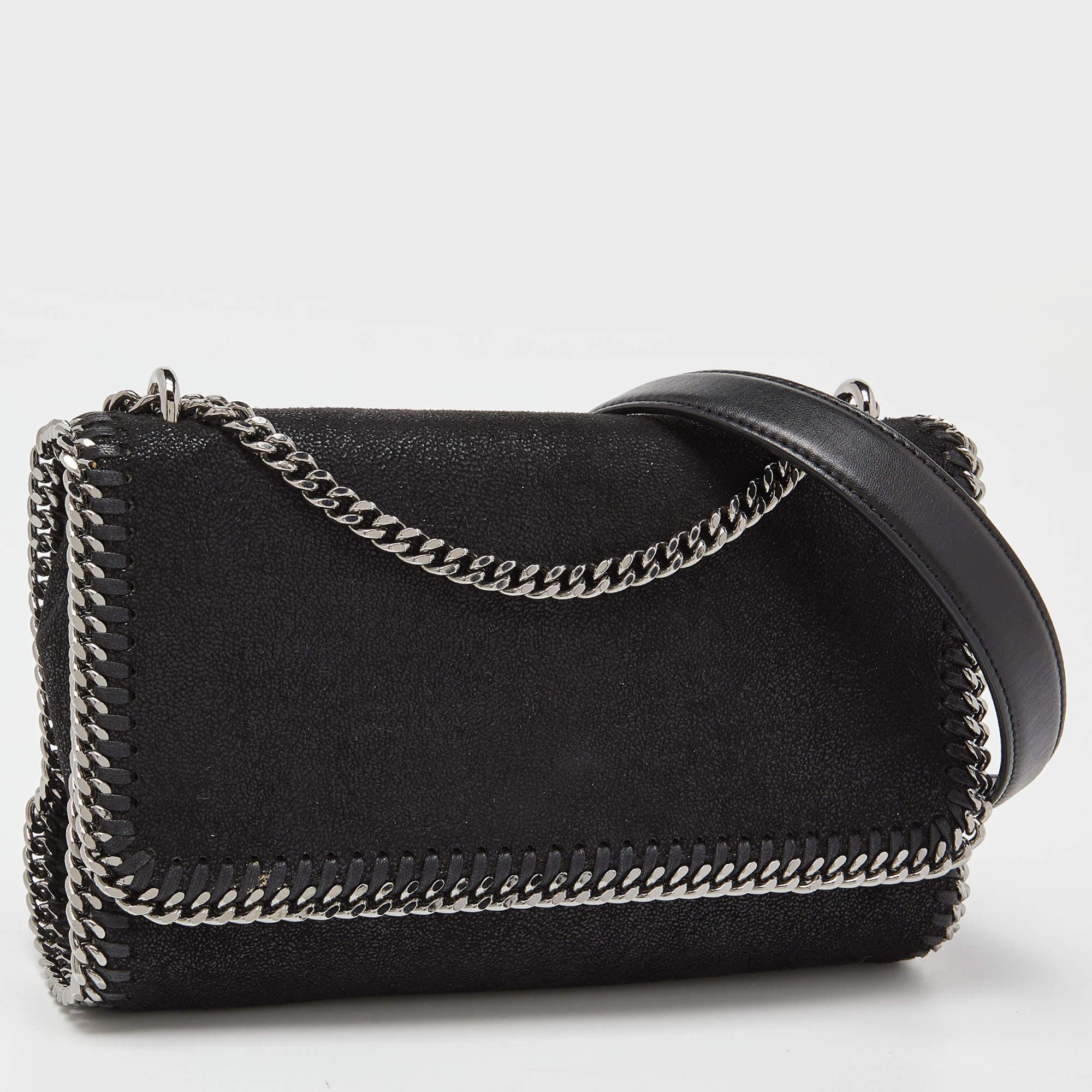 This Falabella shoulder bag from Stella McCartney will make the dream of countless women come true. Crafted from faux suede, it is durable and stylish. While the chain detailing elevates its beauty, the nylon-lined interior will dutifully hold all