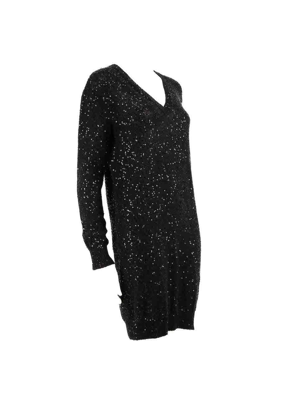 Condition
 
 CONDITION is Very good. Hardly any visible wear to dress is evident on this used Stella McCartney designer resale item.
 
 Details
 
 
 
 Black
 
 Cotton
 
 Knit dress
 
 Sequinned
 
 V-neck
 
 Long sleeves
 
 Mini
 
 
 
 
 
 Size: (M)