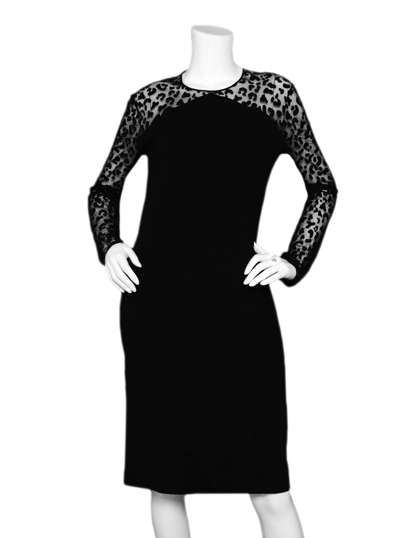 Stella McCartney Black Leopard Chiffon Sleeve Dress sz 48

Made In: Italy
Color: Black 
Materials: 65% rayon, 30% polyamide, 5% elastane. Combo: 70% polyamide, 30% rayon
Opening/Closure: Back hidden zipper
Overall Condition: Excellent pre-owned
