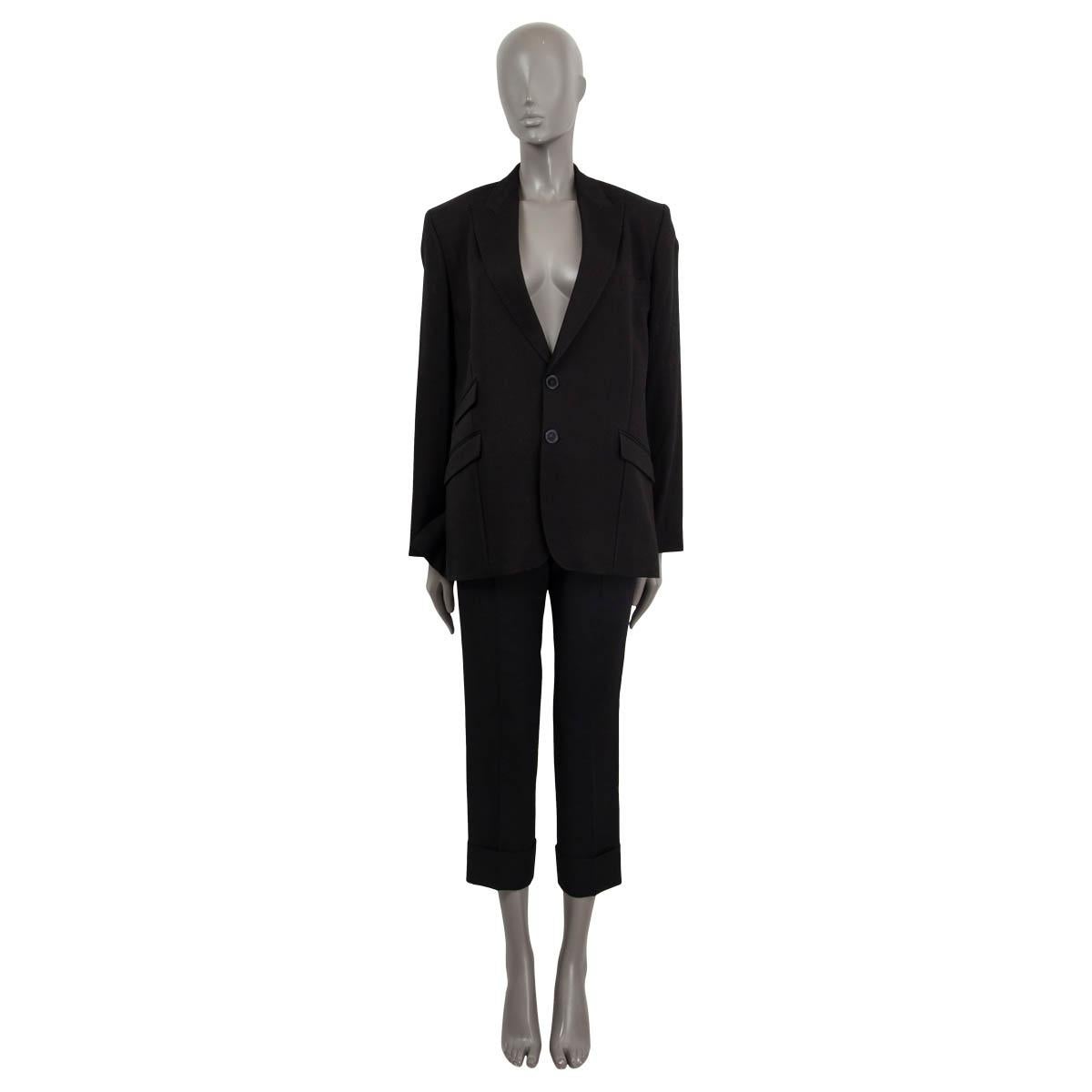 100% authentic Stella McCartney 'Bell' oversized single button blazer in black viscose (86%) and linen (14%). Features buttoned cuffs and three sewn shut flap pockets on the front. Opens with one button on the front. Lined in sand viscose (100%).