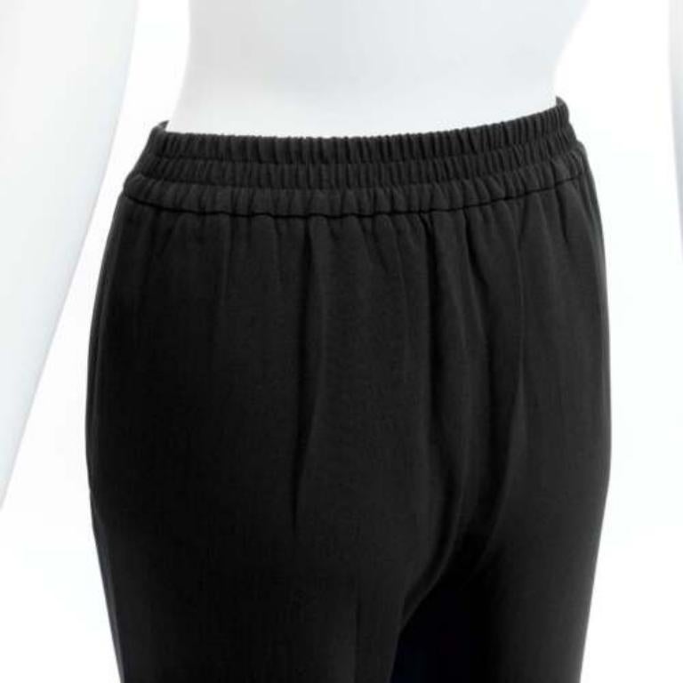 Stella McCartney nero minimalista, pantaloni jogger elasticizzati in vita IT34 XXS
Riferimento: SNKO/A00297
Marchio: Stella McCartney
Materiale: Viscosa, misto
Colore: nero
Modello: Tinta unita
Chiusura: elastica
Dettagli extra: Elastico posteriore