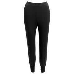 Stella McCartney nero minimalista con elastico in vita, pantaloni jogger harem tagliati