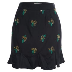 Stella McCartney Falda negra de crepé estampado con volantes S
