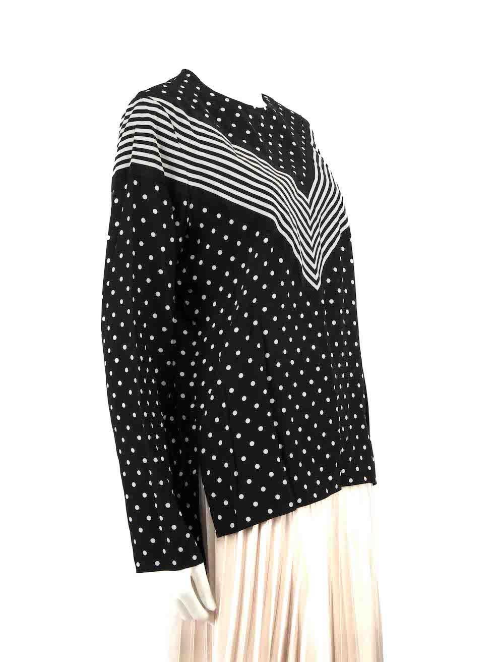 CONDITION is Very good. Minimal wear to dress is evident. Minimal wear to the left underarm with slight discolouration on this used Stella McCartney designer resale item.
 
Details
Black
Silk
Long sleeves blouse
Polkadot and striped pattern
Round