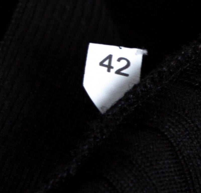 This Stella McCartney sweater is a smart piece that will look good irrespective of what it is being paired with. Cut from a wool & silk blend, it comes in a classic black hue, it is crafted in a fitted silhouette with long sleeves and ribbed