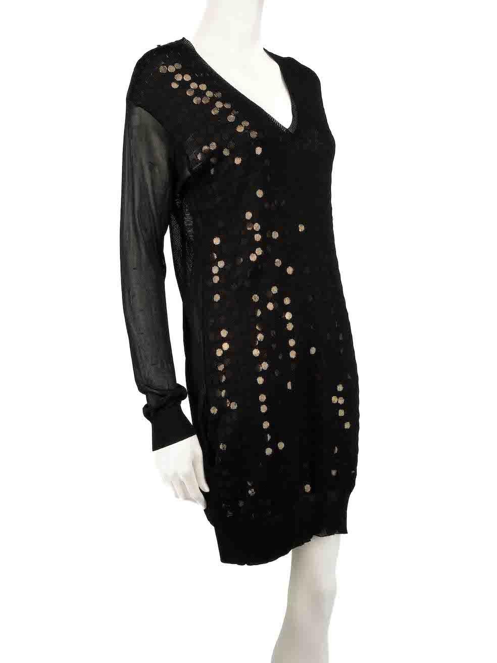CONDITION is Good. Minor wear to dress is evident. Light wear to the composition with a handful of small plucks and pulls to the knit found over the right shoulder on this used Stella McCartney designer resale item.
 
 
 
 Details
 
 
 Black
 
