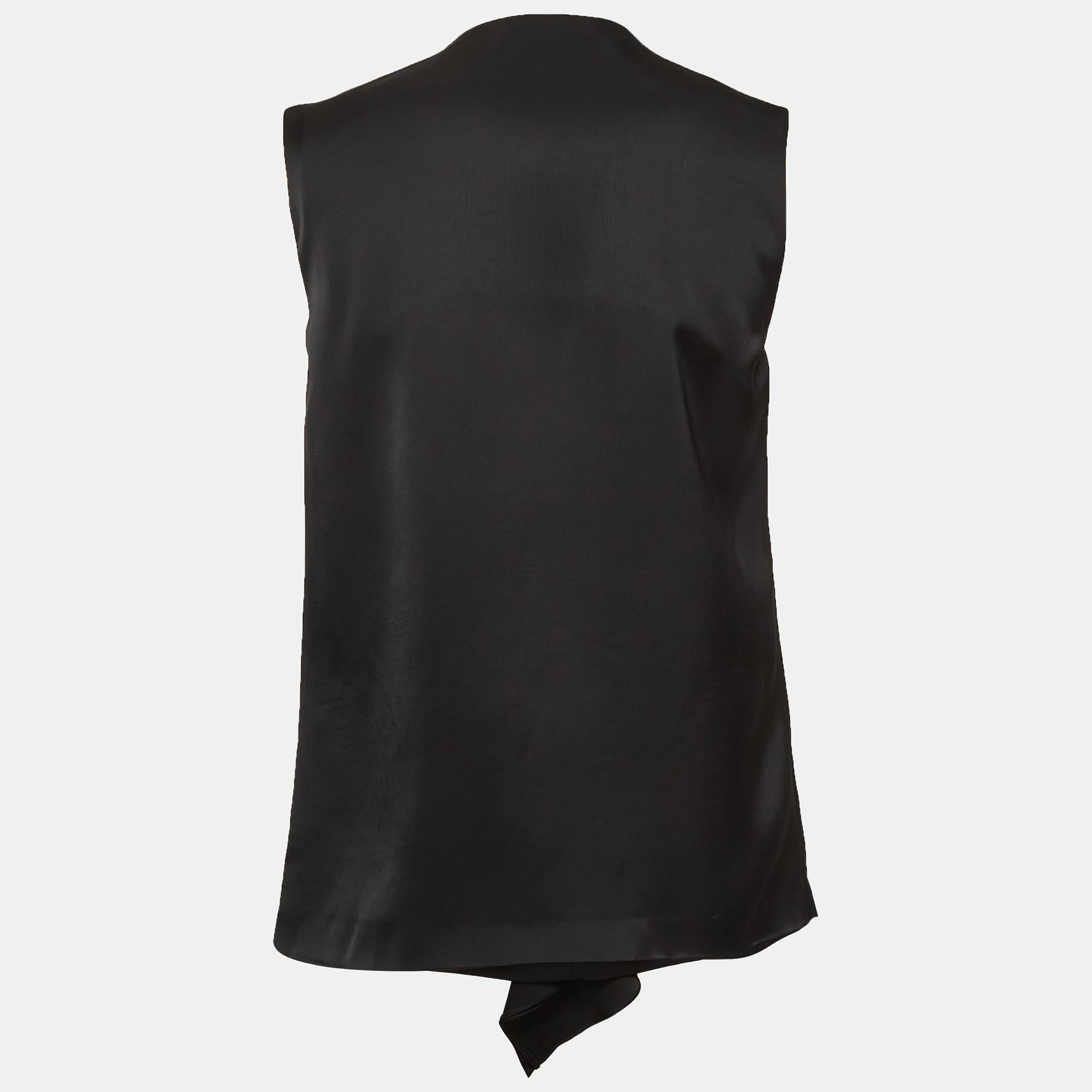 Questo top griffato offre stile e comfort. Realizzata con i migliori tessuti, la creazione è stata curata nei minimi dettagli. Abbinalo a una gonna e a dei tacchi.
