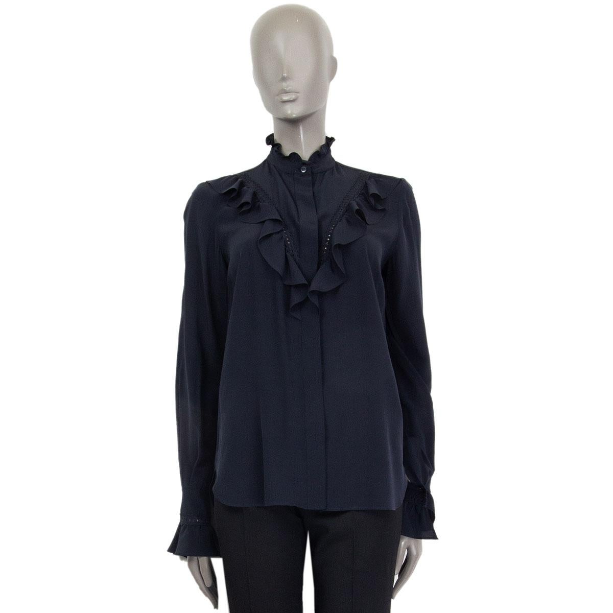 authentic Stella McCartney ruffled silk blouse featuring a stand-up collar and ruched cuffs in black silk (100%). Opens with hidden buttons. Has been worn and is in excellent condition. 

Tag Size 38
Size XS
Shoulder Width3 7cm (14.4in)
Bust 94cm
