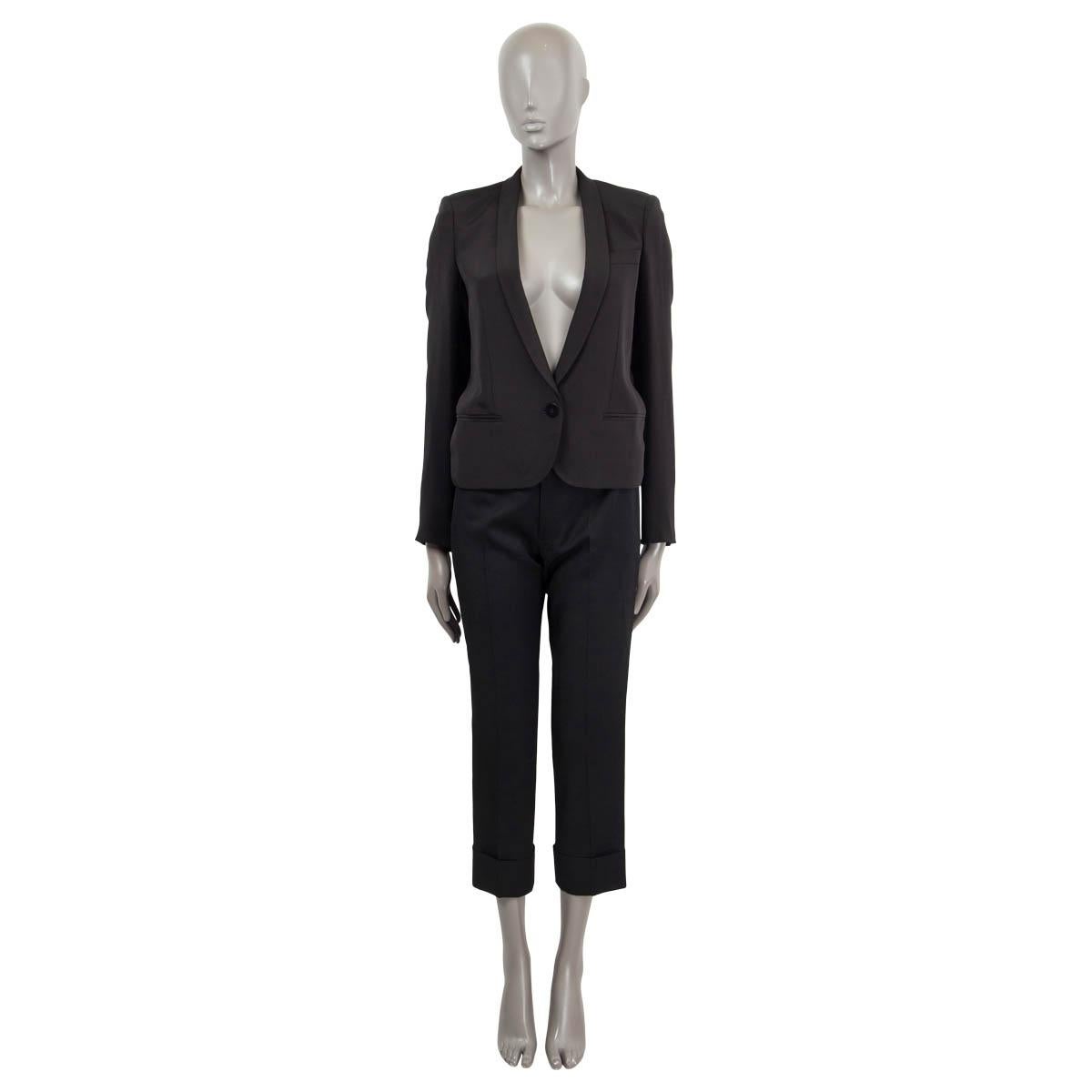 100% authentic Stella McCartney single button cropped blazer in black silk (100%). Two flap pockets and one chest pocket. Lined in black viscose (52%) and cotton (48%). Has been worn and is in excellent condition. 

Measurements
Tag
