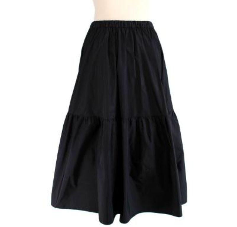 Stella McCartney Black Tiered Puff Skirt

- Made of luscious polyester.
- Perfect fitting skirt.
- Wide bottom skirt.

Made in Hungary.
Do not wash.
Condition 10/10.

PLEASE NOTE, THESE ITEMS ARE PRE-OWNED AND MAY SHOW SIGNS OF BEING STORED EVEN