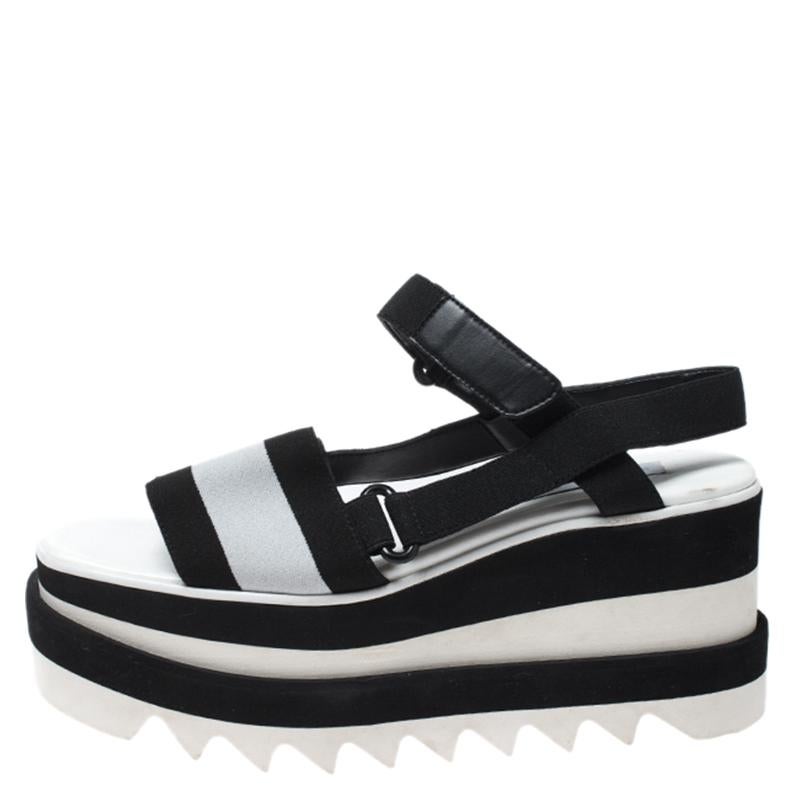 Stella McCartney is one of the leading names when it comes to a pair of gorgeous sandals like this one. Keep your style as comfortable as it can be with these sandals. Crafted from fabric, leather and rubber, they come in black & white hues. They