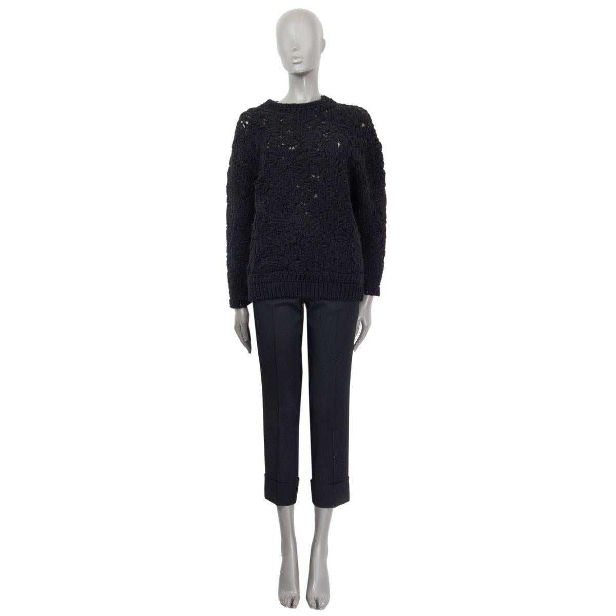 100% authentic Stella McCartney oversized chunky flowr-pattern knit sweater in black wool (45%), acrylic (30%) and alpaca (25%). Has been worn and is in excellent condition. 

Measurements
Tag Size	38
Size	XS
Shoulder Width	114cm (44.5in)
Bust