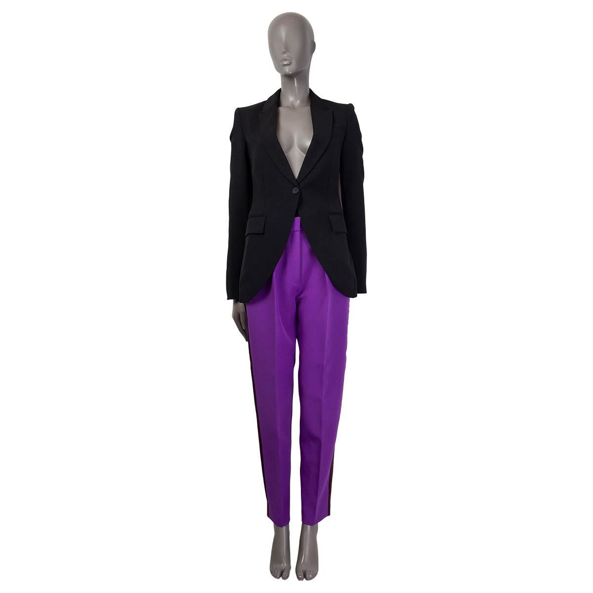 100% authentic Stella McCartney Peak Lapel Longline Fitted Blazer in black wool (80%), mohair (20%) and lined in viscose (50%) and cotton (50%). Blazer closes with one button and has a rounded cropped front. Features two flap pockets and one chest