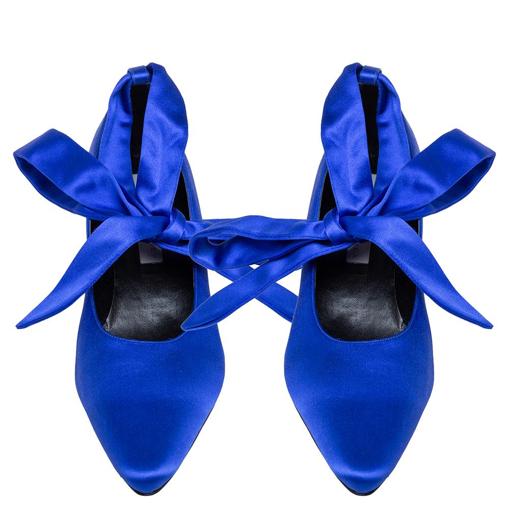 Speak elegance with these pumps by Stella McCartney which are a dream worth owning. Beautifully designed with soft satin, these blue pumps flaunt pointed toes, ankle wraps, kitten heels, and leather insoles. Strike the right pose by assembling the