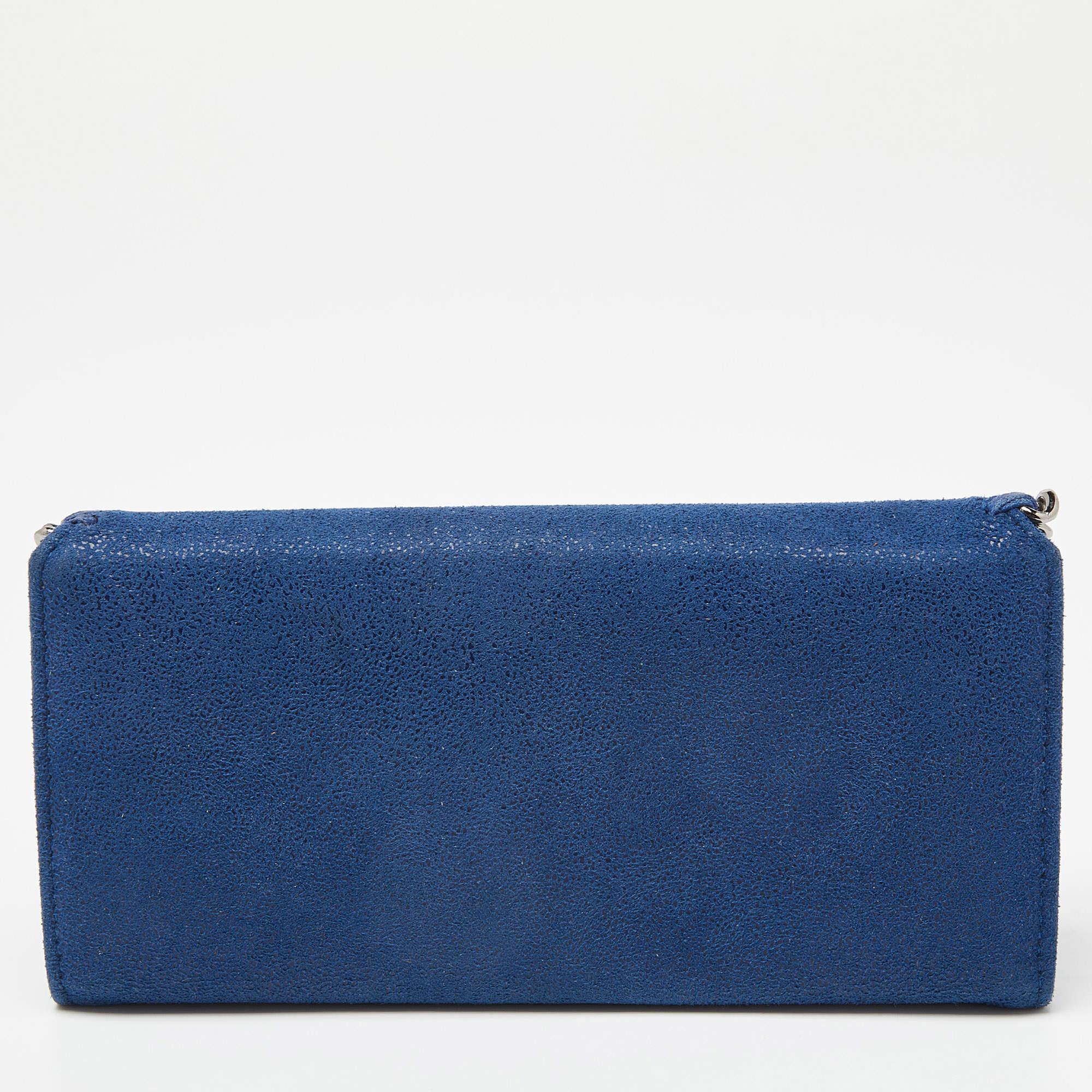 You'll never be tired of carrying this wallet from Stella McCartney because it is brimming with luxurious details. It is crafted from shimmer faux suede and it comes with multiple slots and one zip compartment. Adding to all that, the signature