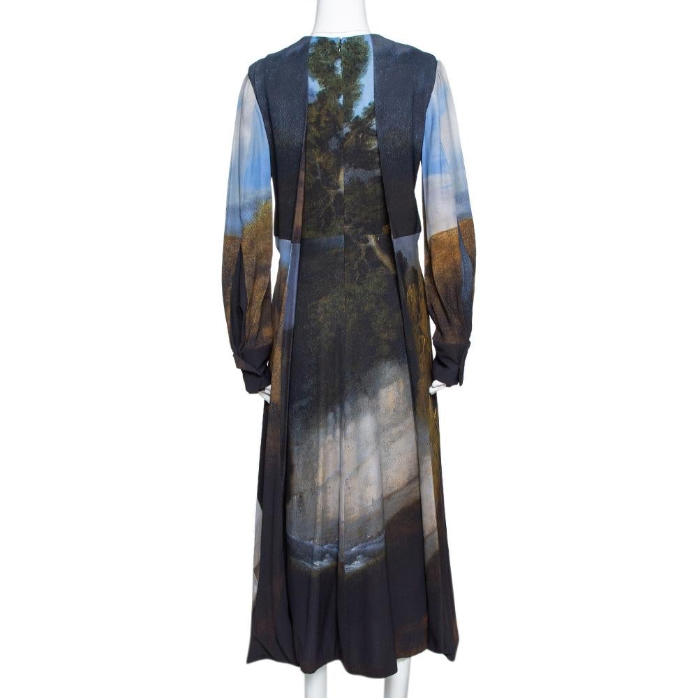 This Stella McCartney dress stands out beautifully. Style this elegant piece with dainty accessories for a unique and attractive look. Designed with a lovely horse print all over and a feminine midi silhouette with a side slit, the dress features