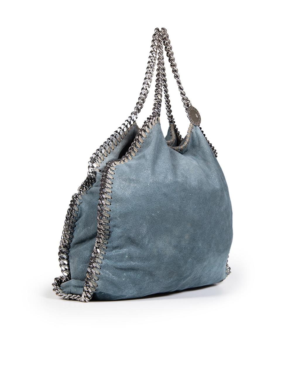 CONDITION is Good. General wear to the bag is evident. Tarnishing across all hardware on the bag. One small hole on the base of the bag. Abrasion to the cloth across the entire bag. Discolouration on the outer stitching of the bag and on the bag