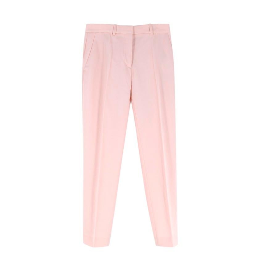 Stella McCartney Blush Pink Wool Tailored Trousers
 

 - Tailored wool trousers in blush pink
 - Tapered leg fit
 - Belt loops
 - Concealed zip fly and hook&loop closure
 - Unlined design
 

 Materials:
 100% Wool
 

 Made in Hungary
 Dry clean