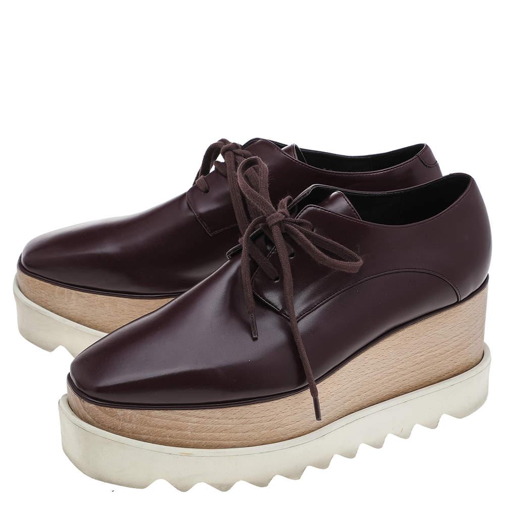 Stella McCartney proves her high style and unique fashion taste with these Elyse derby shoes. They are brimming with exquisite details like the lush burgundy faux leather exterior, the matching laces, and the thick serrated platforms. Grab this pair