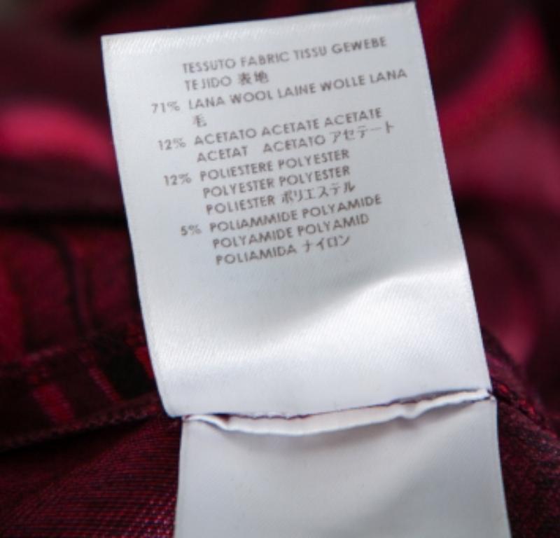 A fabulous dress like this one from Stella McCartney deserves to have a place in every fashionista's closet. Luxuriously made from a wool blend and artfully detailed with floral jacquard, this burgundy dress has long sleeves and a hem ending above
