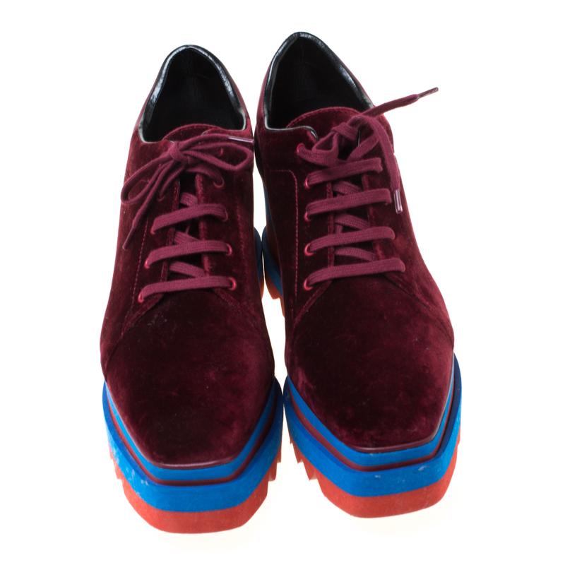 Stella McCartney proves her high style and unique fashion taste with these Elyse derbies. They are brimming with exquisite details like the lush burgundy velvet exterior, lace-ups on the vamps and the thick platforms. Grab this pair today and let it
