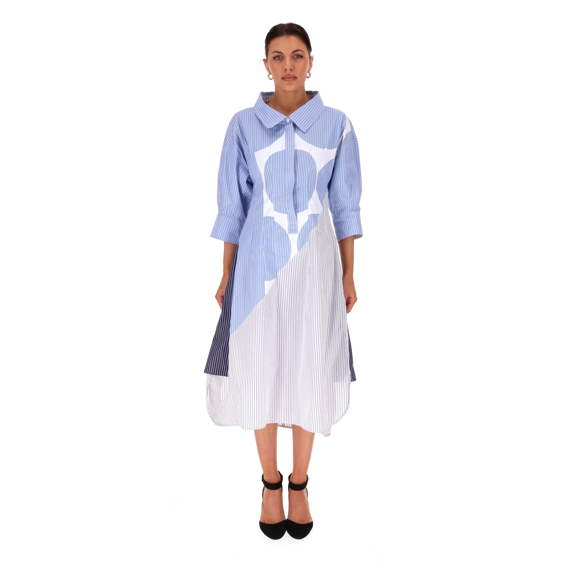 Stella McCartney Circle-Print Striped Cotton Shirt Dress

Light blue 'Sandrina' shirt dress crafted from cotton with geometric prints.

Featuring three-quarter sleeves, collared neckline, flared midi skirt and centre button closure.

Comes with the
