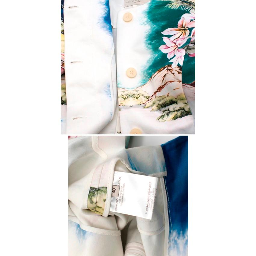 Stella McCartney Cotton Hawaiin Print Jacket

-Collarless jacket with rounded shoulder
-Four buttons the front with cropped sleeves
- Split to sides with back hemline falling lower than front
-Partially lined
Materials
Shell - 100% cotton
Lining -