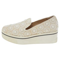 Stella McCartney Cremefarbene Slip on Turnschuhe aus geblümter Spitze Größe 36