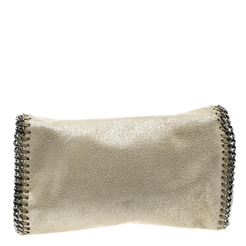 One of Stella McCartney's most famous designs is the Falabella. This crossbody bag is crafted from faux leather and features black-tone hardware, including chain trims on the edges and a shoulder chain. It has a magnetic closure on the flap and a