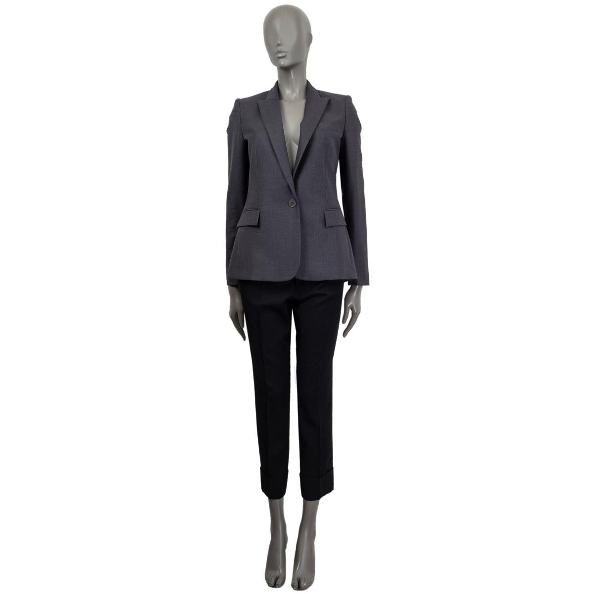 100% authentic Stella McCartney fitted one-button blazer in charcoal wool (100%) and lined in black viscose (52%) and cotton (48%). Sleeve lining is viscose (100%). Has been worn and is in excellent condition.

Measurements
Tag