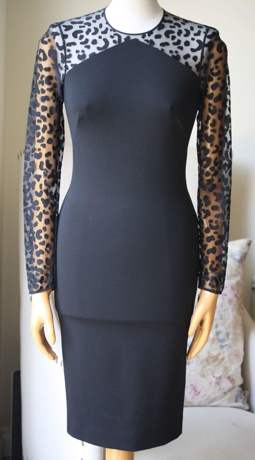 Cocktail dressing has never been simpler thanks to Stella McCartney's black dress. Crafted in Italy, this design is cut from figure-sculpting stretch-jersey and features leopard devoré sleeves. Black stretch-jersey. Concealed hook and zip fastening
