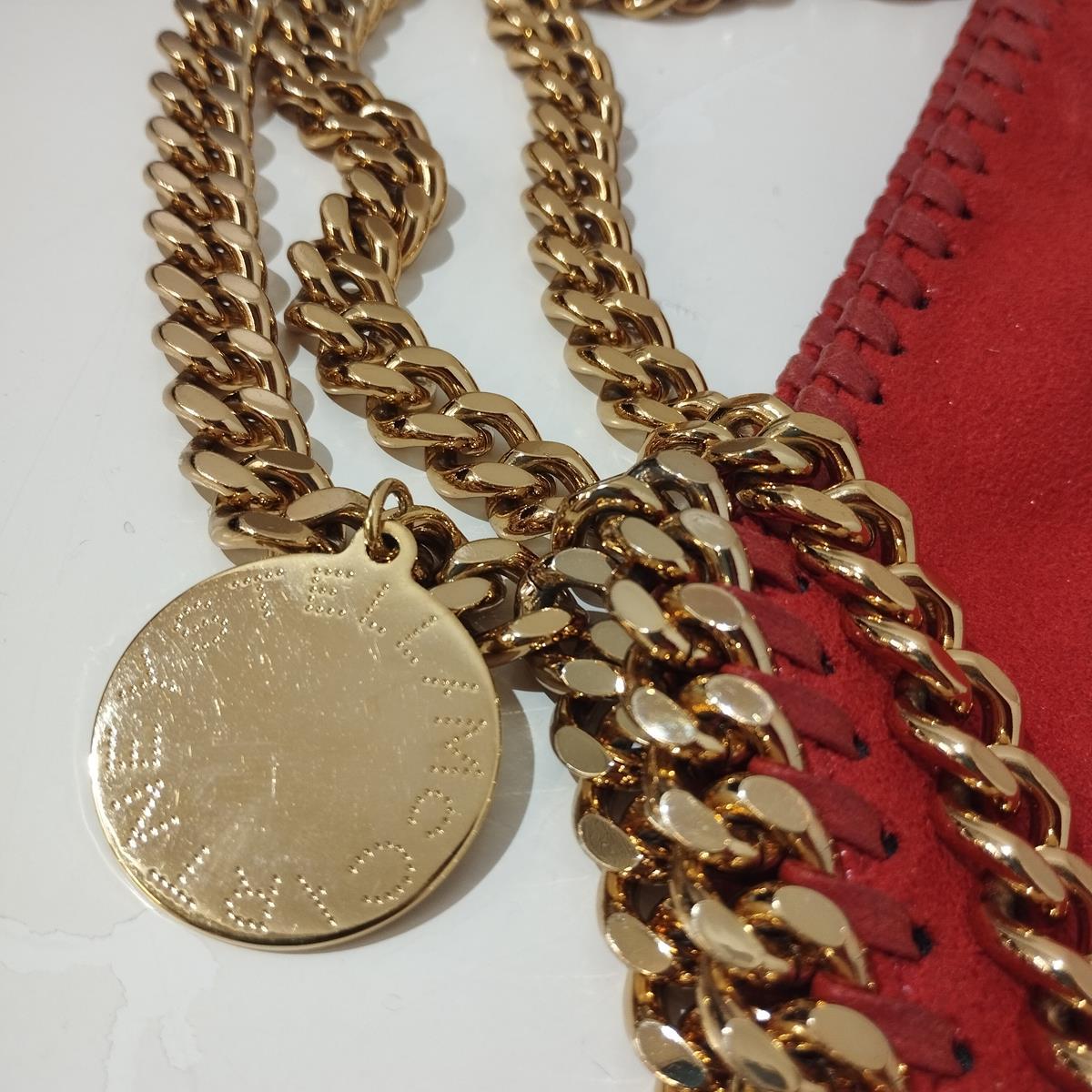 Falabella Bag
Vegan leather
Red color
Golden chain
Two handles
Magnetic button closure 
Large internal pocket
Cm 36 x 36 (14,1 x 14,1 inches)
Free Express shipping via Fedex or DHL