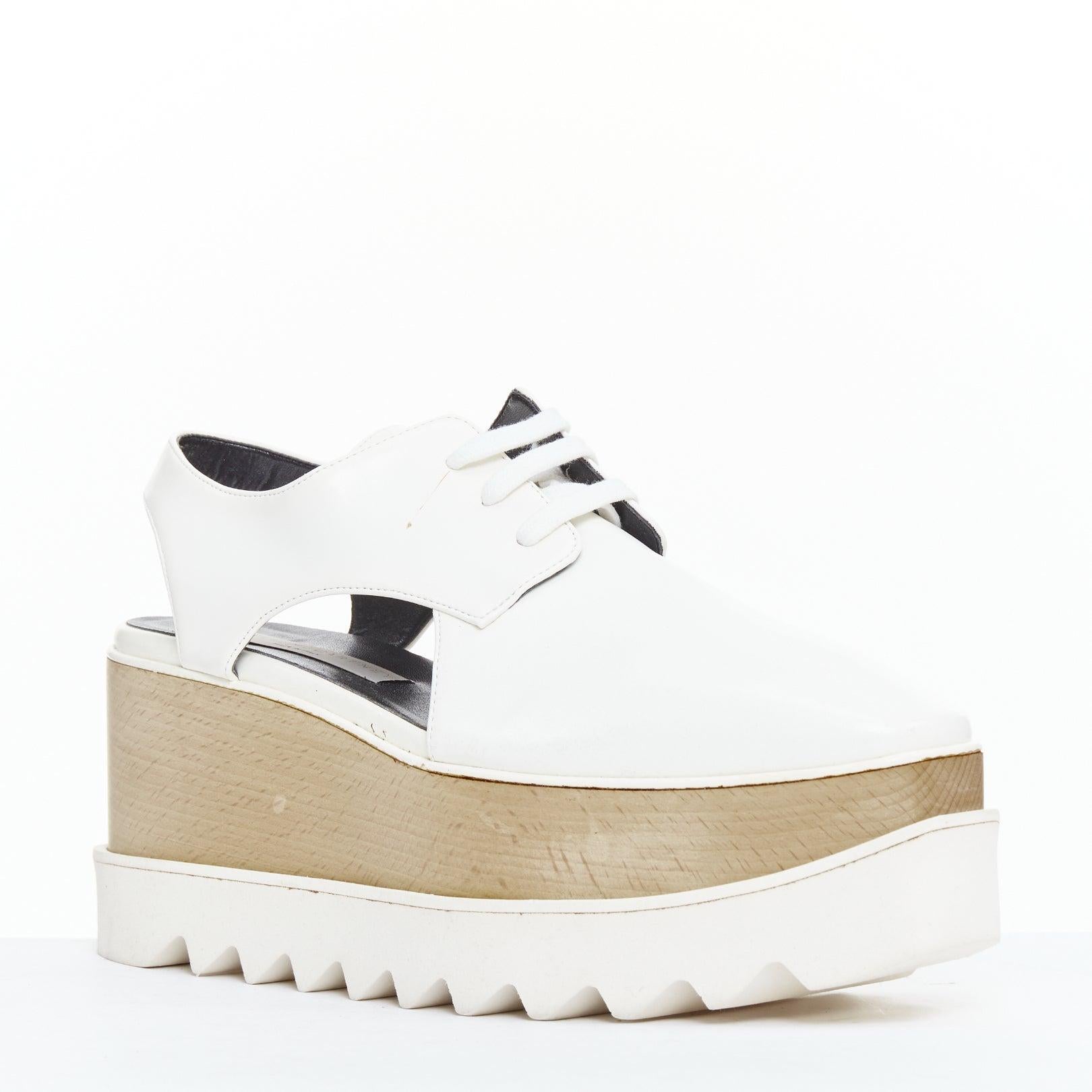 STELLA MCCARTNEY Elyse weißes veganes Leder zum Schnüren Plattform EU39
Referenz: WYHI/A00005
Marke: Stella McCartney
Modell: Elyse
MATERIAL: Stoff, Holz
Farbe: Weiß, Beige
Muster: Solide
Verschluss: Schnürung
Innenfutter: Schwarzer