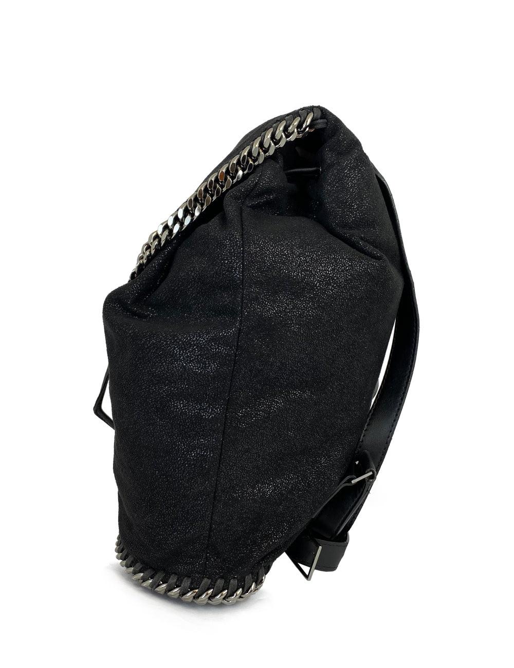 Black Stella McCartney satchel backpack. Featuring animal-friendly faux black leather with a metallic sheen. Signature Falabella chain incorporated throughout the edges of the bag, lengthy leather shoulder straps with adjustment buckles, and a top