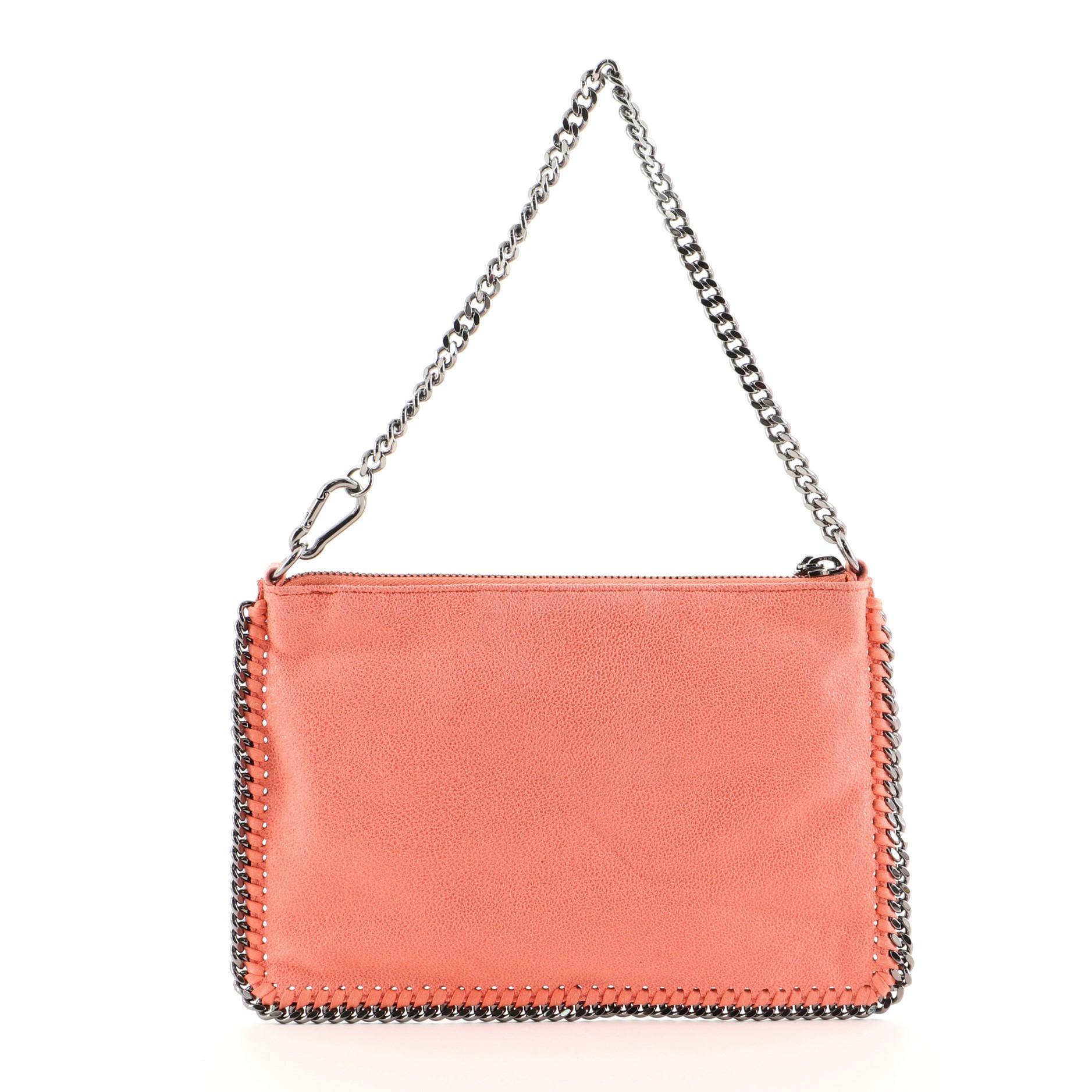 Stella McCartney Falabella Pochette Shaggy Deer
Orange

Condition Details: Moderate wear on base and opening trims, small glue stain on front opening corner, scratches on hardware.

52311MSC

Height 5