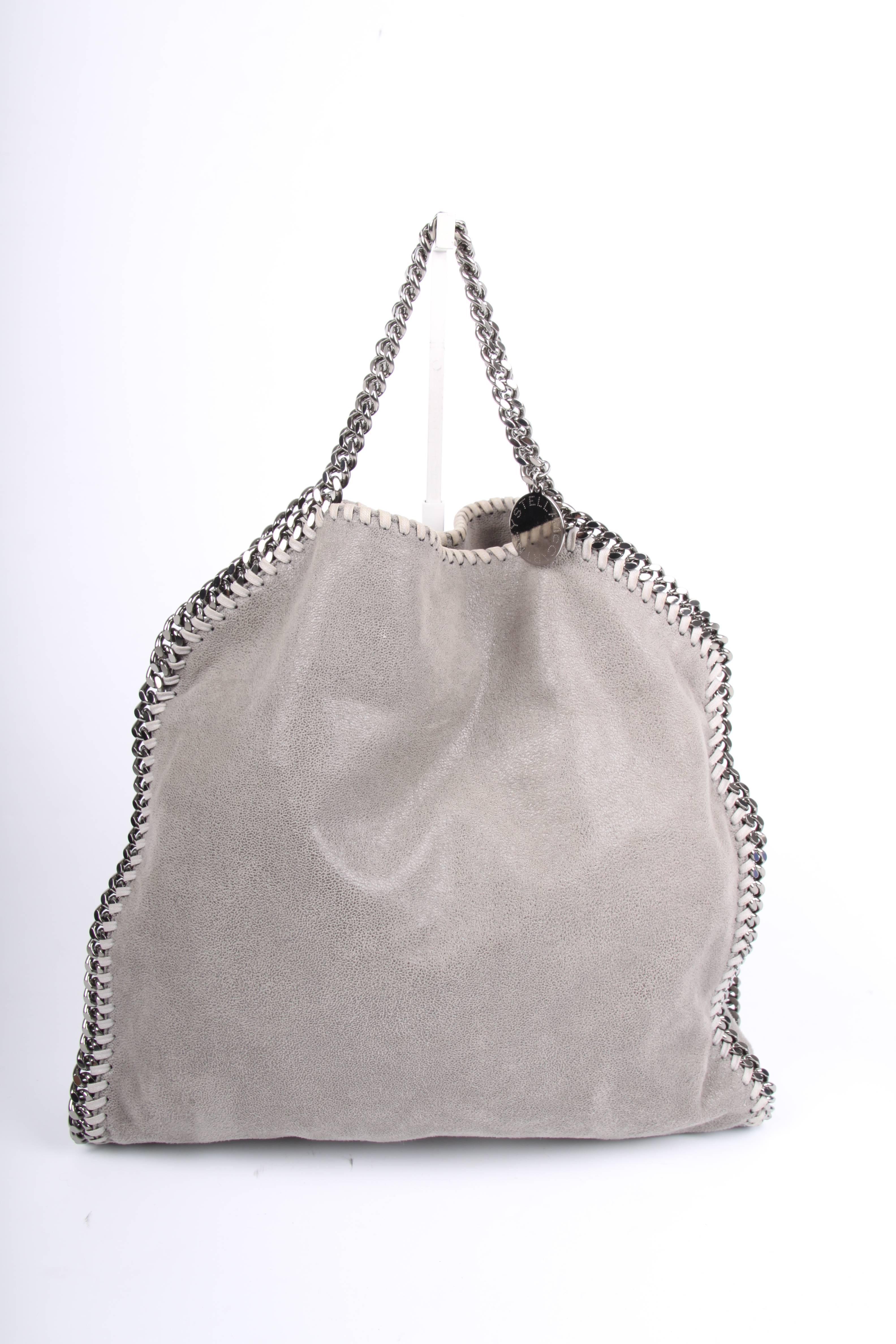 Stella McCartney is known for her use of animal friendly and durable materials. Go Stella!

This Falabella Shaggy Deer Bag is made of 100% polyester, but looks like soft and supple leather. Executed in a light grey color and embellished with