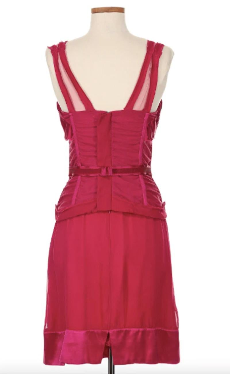 Stella McCartney Fall 2003 Magenta Silk Corset Mini Dress. The iconic SJP was styled for Vogue in this gorgeous Chloe by Stella McCartney look that we’re so lucky to have in our collection. This dress is part of the 2003 Chloe collection by Stella