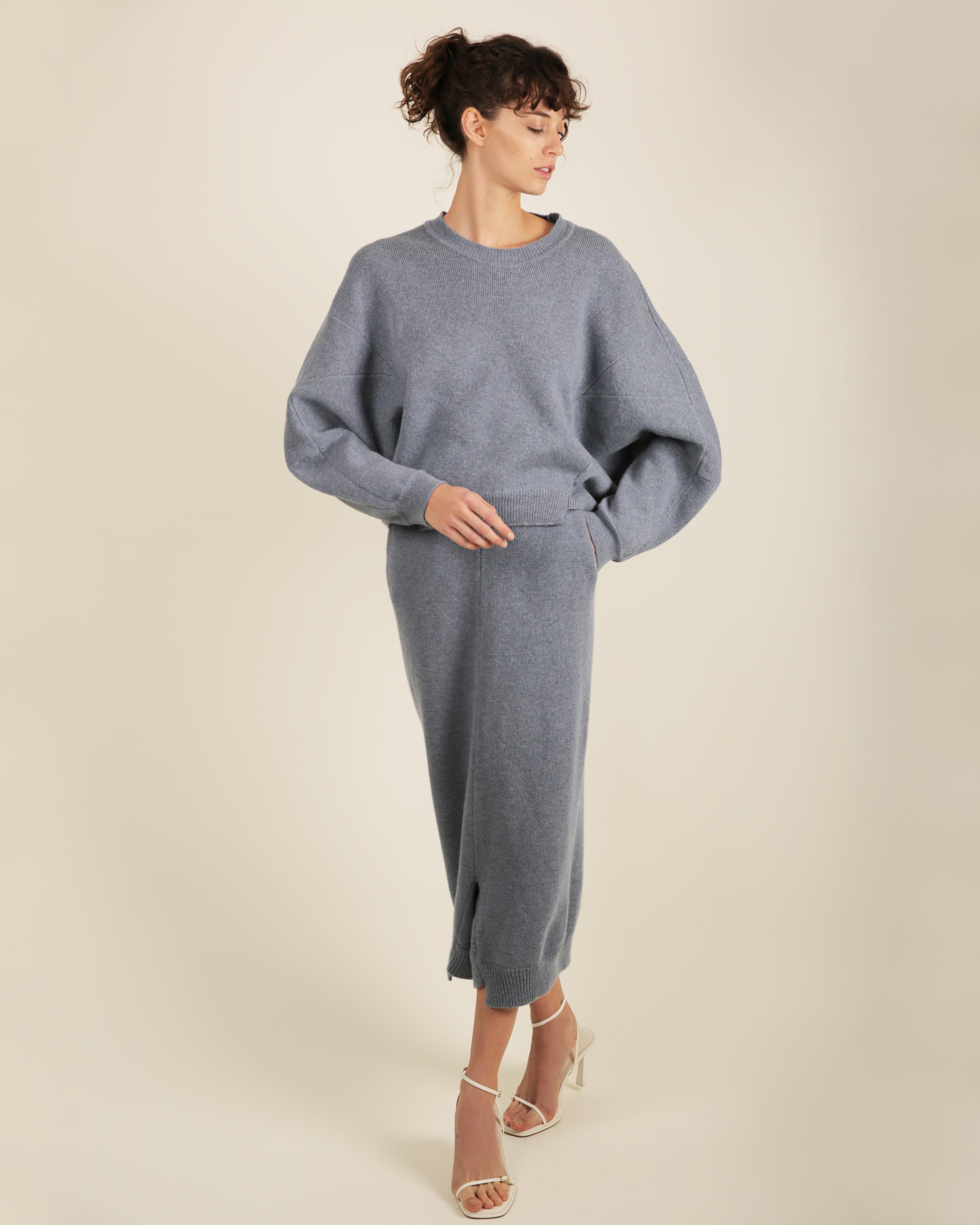 LOVE LALI Vintage

Stella McCartney Fall 2018 matching set in a dusky blue
Consists or an oversized drop shoulder sweater with ribbed neck, cuffs and hemline - and matching sarouel (dropped crotch) pants, featuring an elasticated high waist, two