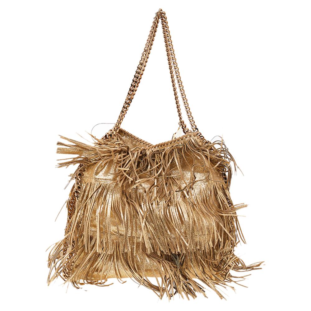 This Falabella tote from Stella McCartney is one of the most loved designs from the sustainably conscious label. Crafted from faux leather, it is durable and stylish. While the fringe detailing elevate its beauty, the lined interior will dutifully