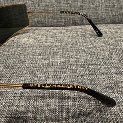 Stella McCartney Gold Logo Studded Shield Sunglasses