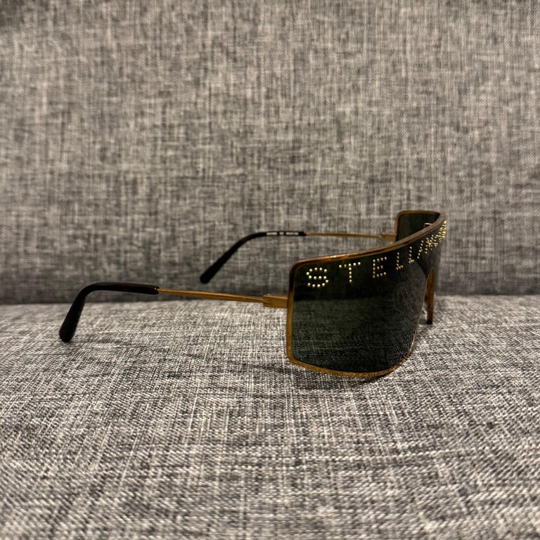 Stella McCartney Gold Logo Studded Shield Sunglasses at 1stDibs display picture 2