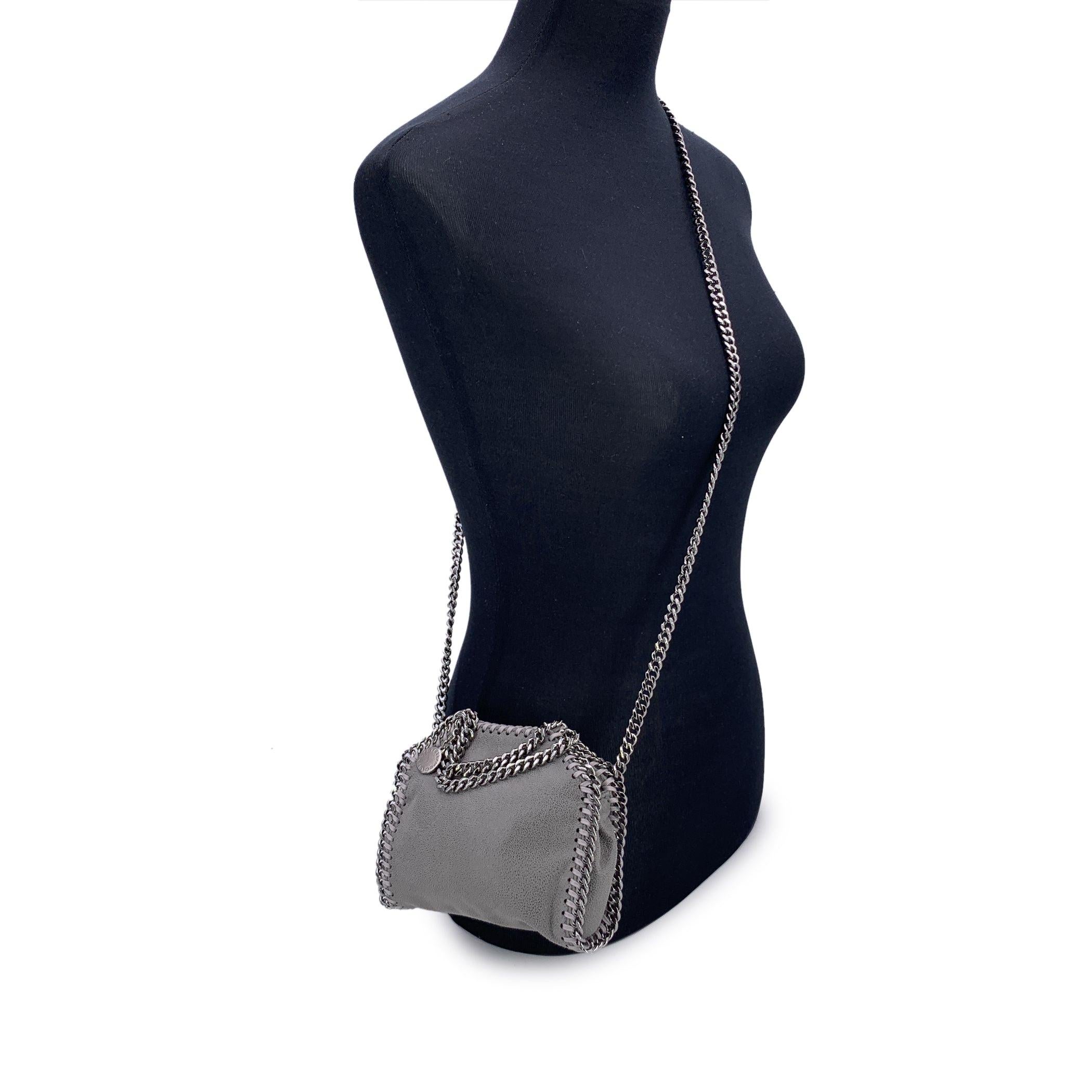 Embrace eco-conscious luxury with Stella McCartney's iconic Falabella Micro Bag, a stunning blend of contemporary style and sustainable craftsmanship. Made from environmentally friendly faux suede, this bag offers a chic, animal-friendly alternative