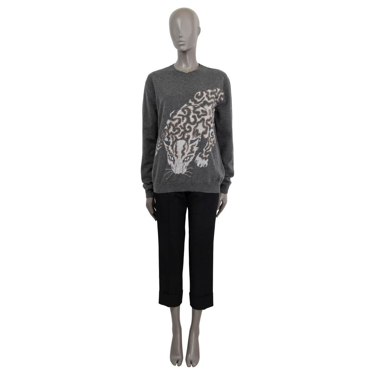 100% authentic Stella McCartney oversized fine-knit sweater in gray wool (100%). Features panther print in light gray and taupe with a round neck. Has been worn and is in excellent condition.

Measurements
Tag Size	40
Size	S
Shoulder Width	48cm