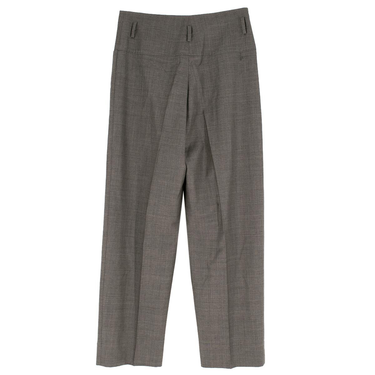 Stella McCartney Grey Wool Straight Trousers

- grey wool trousers
- straight relaxed fit 
- zip and button fastening 
- two front slip pockets 
- belt hoops

Please note, these items are pre-owned and may show some signs of storage, even when