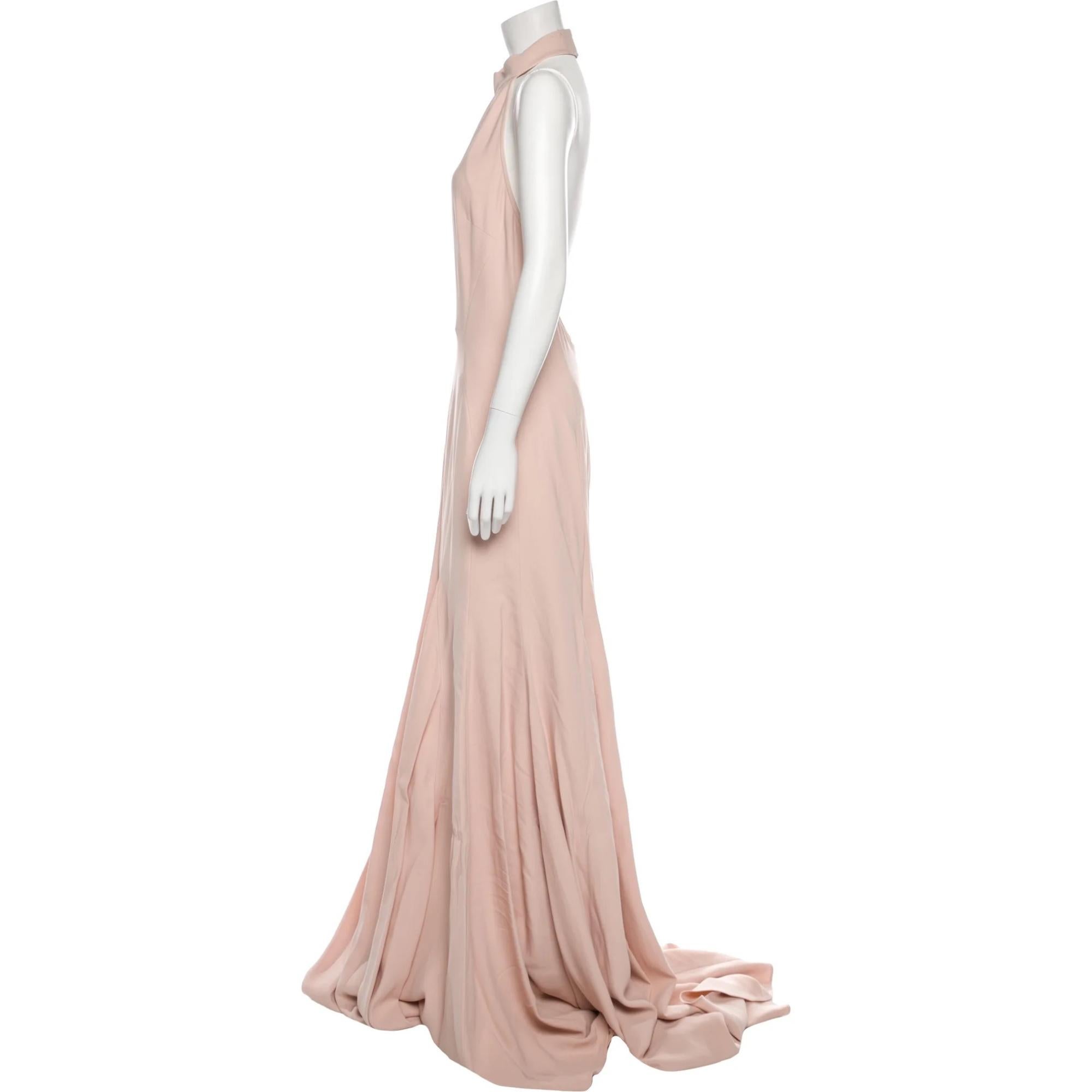 Stella McCartney Evening Gown. Pink. Ruffle Embellishment. Halterneck. Concealed Zip Closure at Back. Designer Fit: Dresses by Stella McCartney typically fit true to size.

Color: Light pink
Material: 64% Viscose, 32% Acetate, 4% Elastane
Condition: