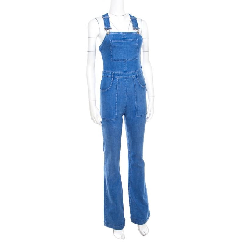 Stella McCartney brings you just the right addition you need this season in the form of this overalls. It has a racer backline, wide legs and will give you a great fit. You can team it with an off-shoulder top or a t-shirt and heels or